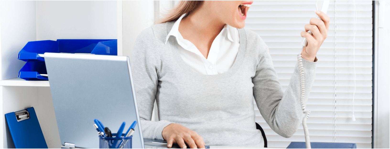 Woman yelling on support call with internet provider