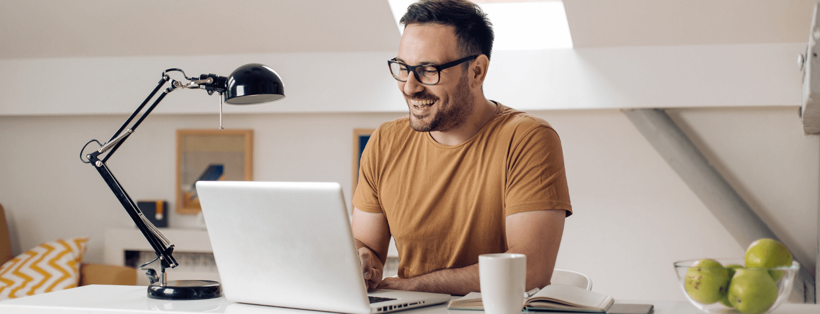 Happy man with laptop