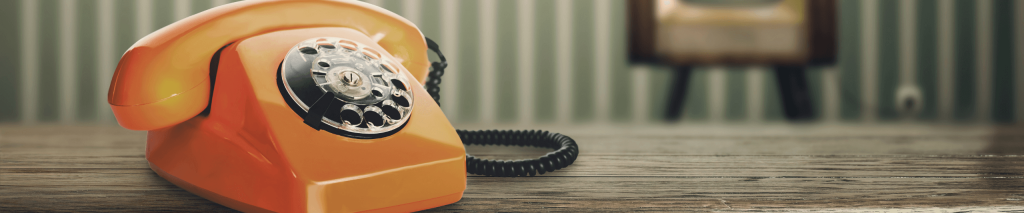 Image showing coins in ascending stacks next to a clock