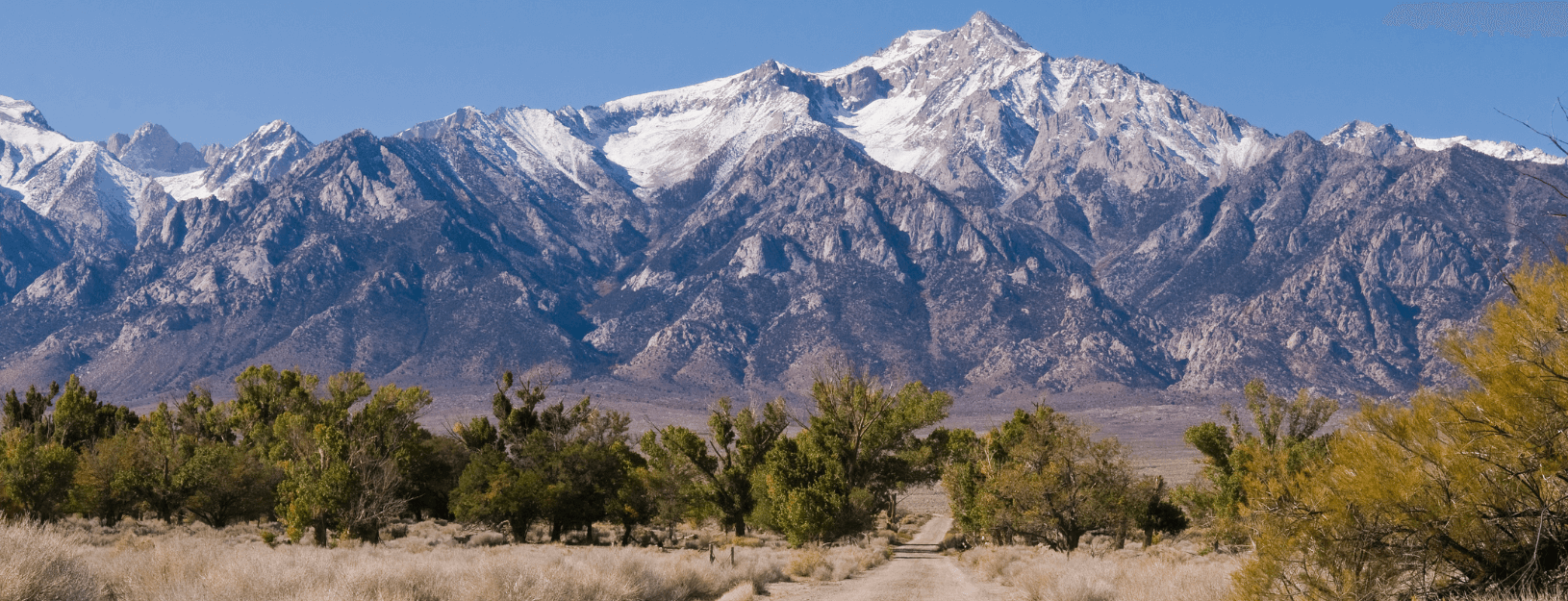 Photo of a mountain range and ski resort in Colorado