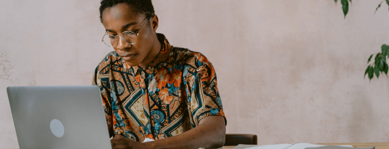 Happy family viewing laptop together