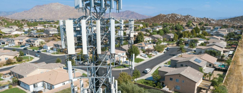 Aerial view of a fixed wireless tower in a rural residential neighborhood