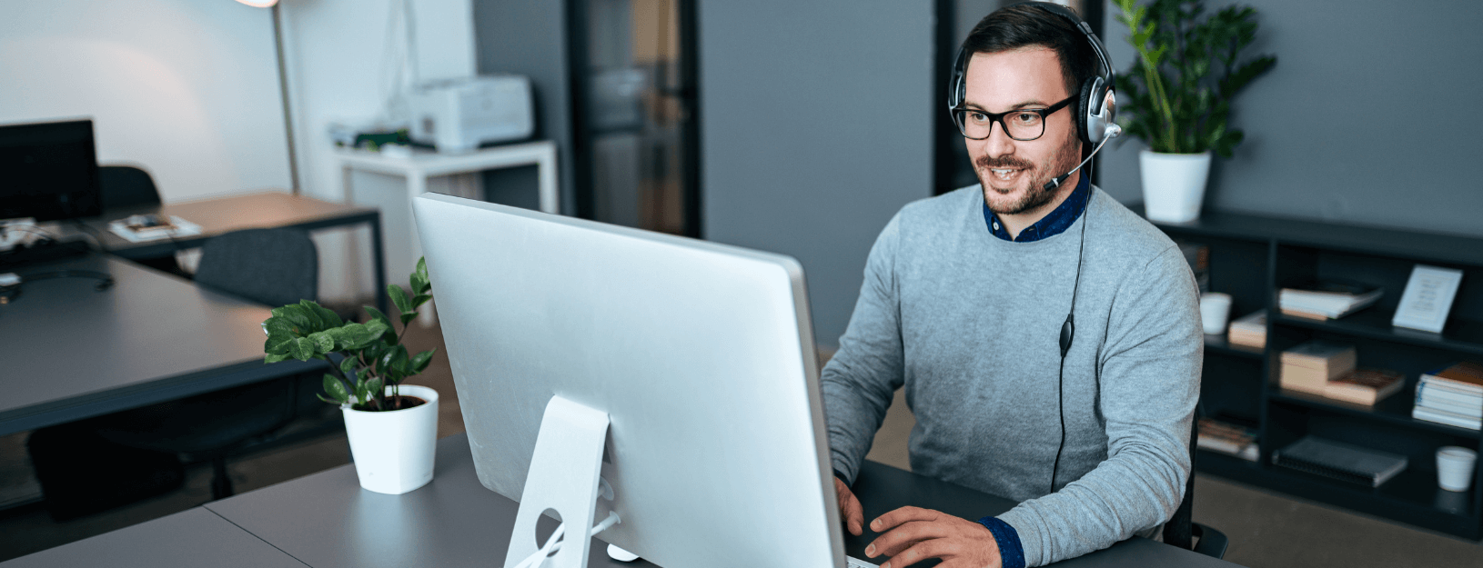 A member of a support team conducting a call with a client