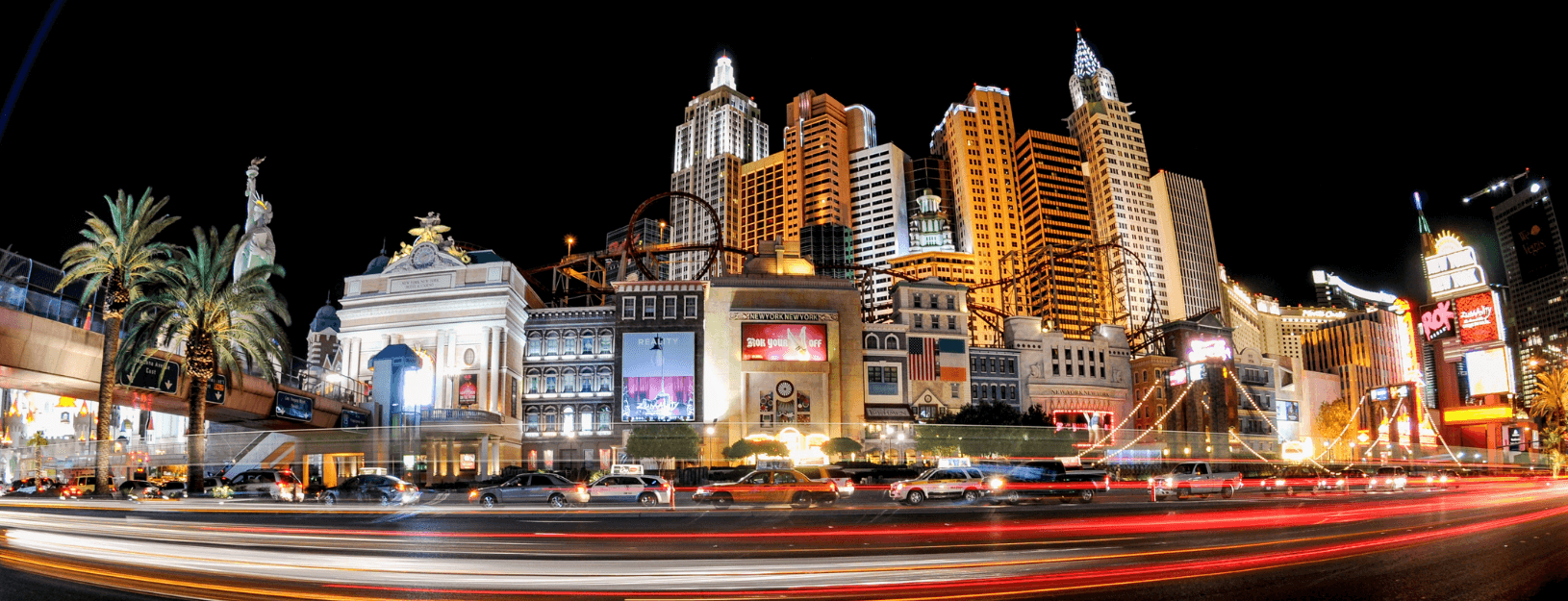 A view of Las Vegas from a distance with mountains in background