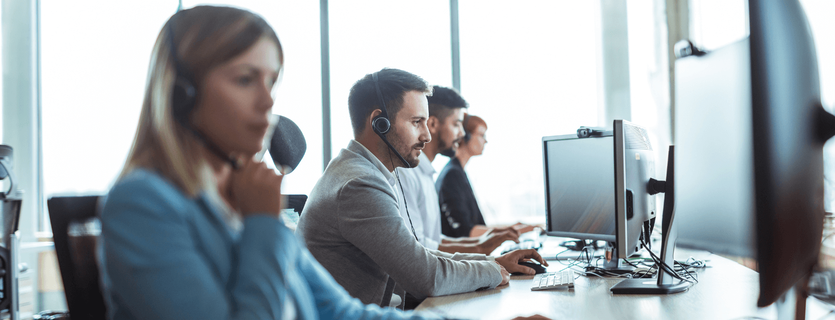 A trio of support team members at work