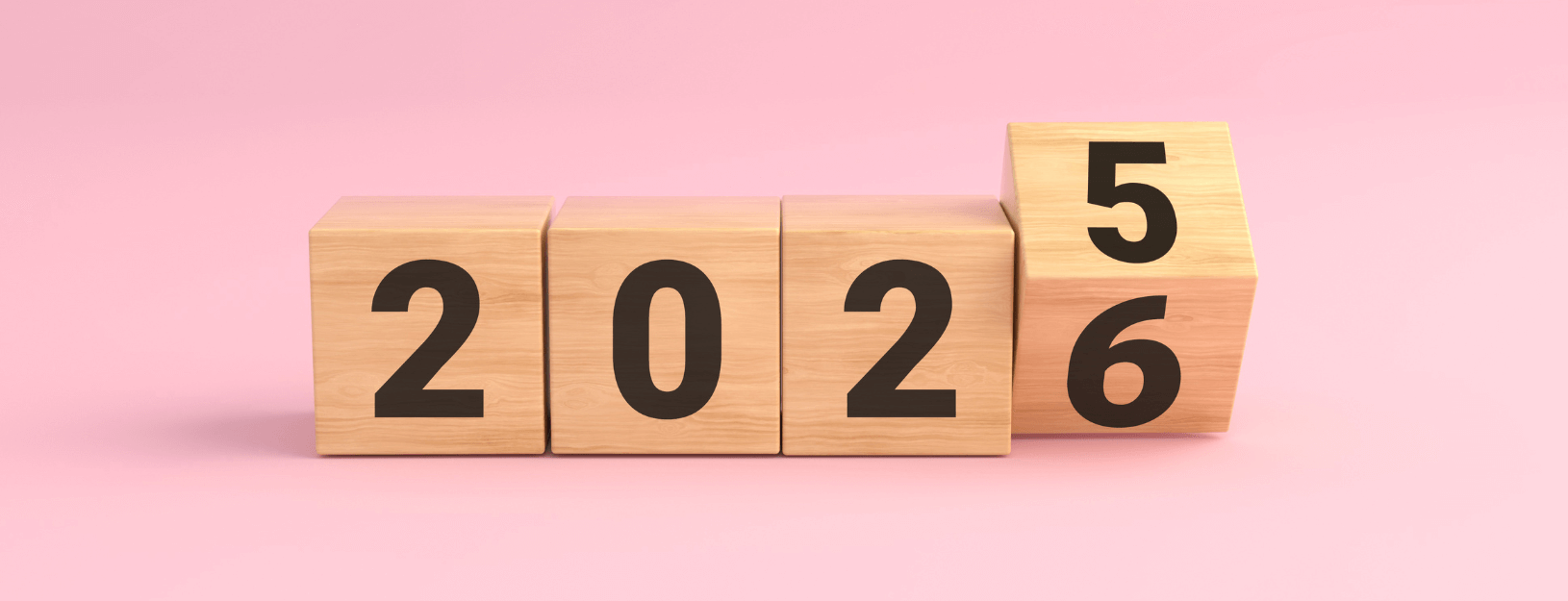 Building blocks showing 2025 turning to 2026