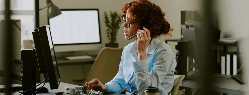 Support agent on the phone with a customer