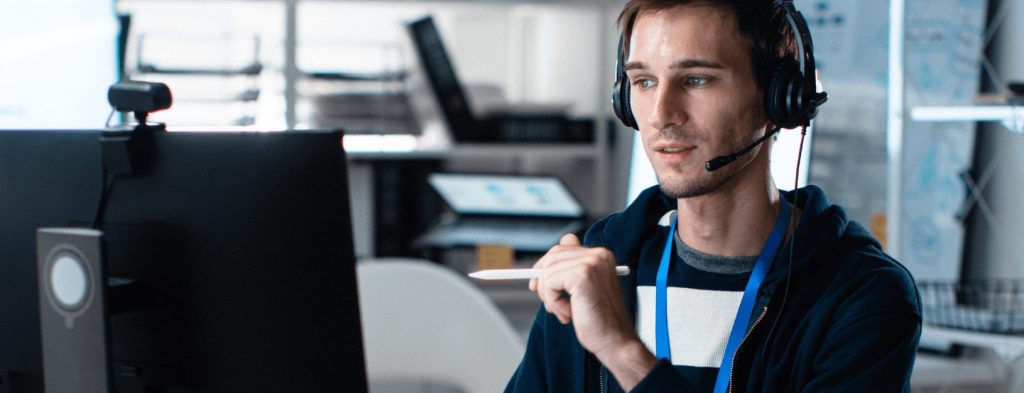 A customer support professional is on a call with a customer